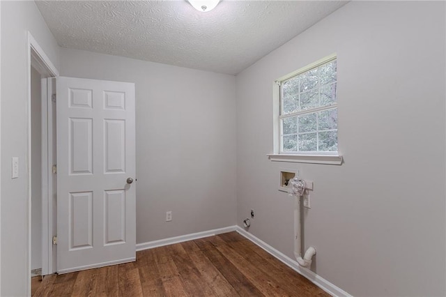 260 Pleasant Grove Cir, Mcdonough, GA 30252 - laundry area featuring hookup for a washing machine, wood finished floors, a textured ceiling, and baseboards