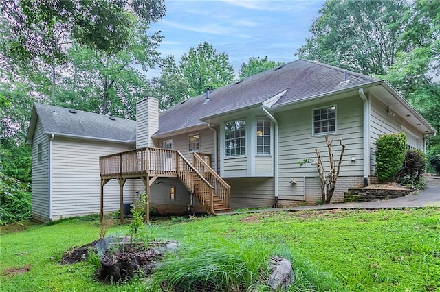 260 Pleasant Grove Cir, Mcdonough, GA 30252 - rear view of property with a wooden deck, a yard, a chimney, and roof with shingles