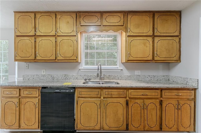 260 Pleasant Grove Cir, Mcdonough, GA 30252 - kitchen featuring dishwasher, a sink, brown cabinetry, and light stone countertops