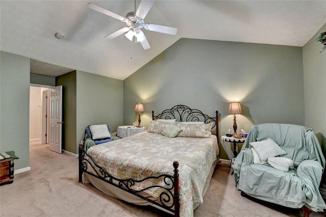 bedroom with ceiling fan, light colored carpet, and lofted ceiling