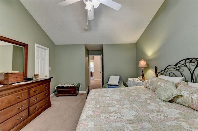 bedroom with ceiling fan, lofted ceiling, and light carpet