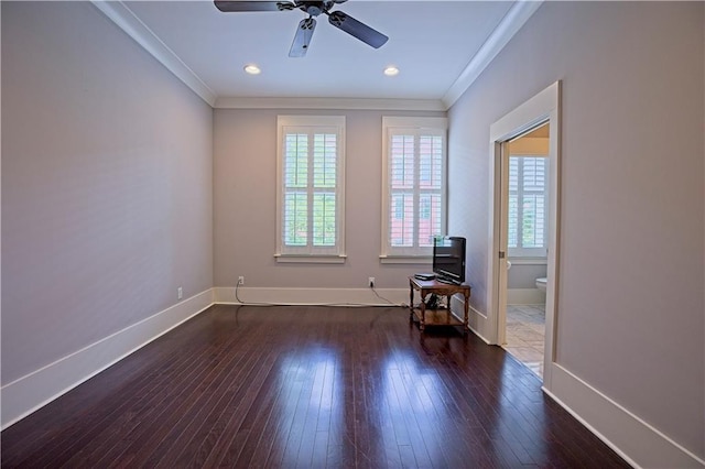empty room with crown molding, a ceiling fan, baseboards, and a healthy amount of sunlight