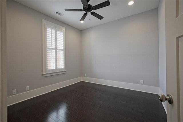 spare room with visible vents, baseboards, dark wood-type flooring, recessed lighting, and a ceiling fan