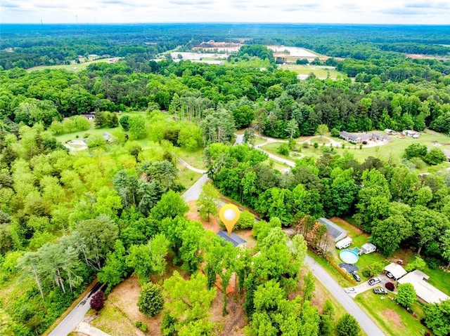 bird's eye view with a forest view