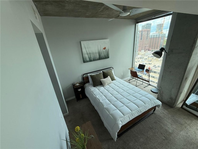 860 Peachtree St NE Unit 1411, Atlanta, GA 30308 - bedroom featuring carpet and baseboards