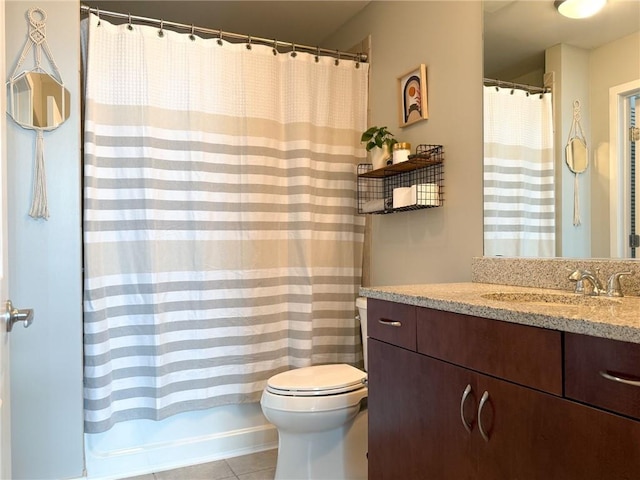 860 Peachtree St NE Unit 1411, Atlanta, GA 30308 - bathroom featuring vanity, toilet, and tile patterned floors