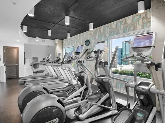 860 Peachtree St NE Unit 1411, Atlanta, GA 30308 - exercise room with wallpapered walls
