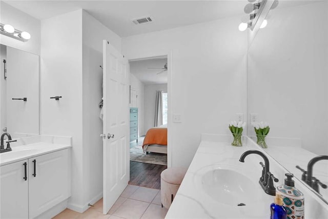 bathroom featuring wood-type flooring and vanity