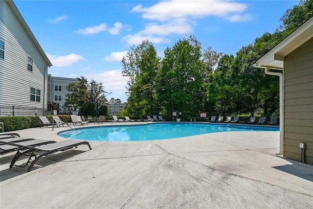 view of swimming pool featuring a patio