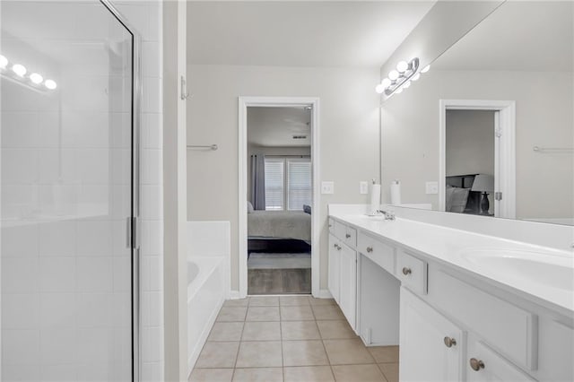 1804 Evadale Ct Unit 1, Mableton, GA 30126 - ensuite bathroom with double vanity, a shower stall, tile patterned floors, and a garden tub
