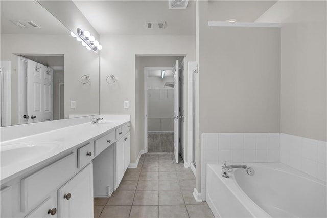 1804 Evadale Ct Unit 1, Mableton, GA 30126 - full bathroom featuring double vanity, a bath, tile patterned flooring, and a stall shower