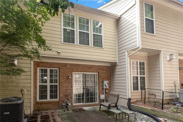 1804 Evadale Ct Unit 1, Mableton, GA 30126 - back of house with a patio and brick siding