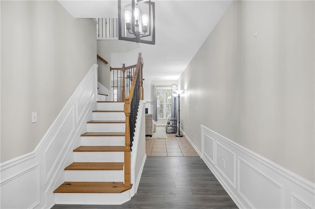1804 Evadale Ct Unit 1, Mableton, GA 30126 - stairway featuring a decorative wall, a chandelier, wainscoting, and wood finished floors
