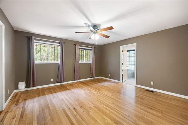 3272 Pinestream Rd NW, Atlanta, GA 30327 - unfurnished room with light wood-style flooring and ceiling fan