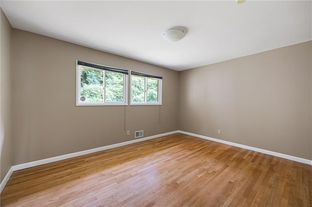 3272 Pinestream Rd NW, Atlanta, GA 30327 - unfurnished room with light wood finished floors and baseboards