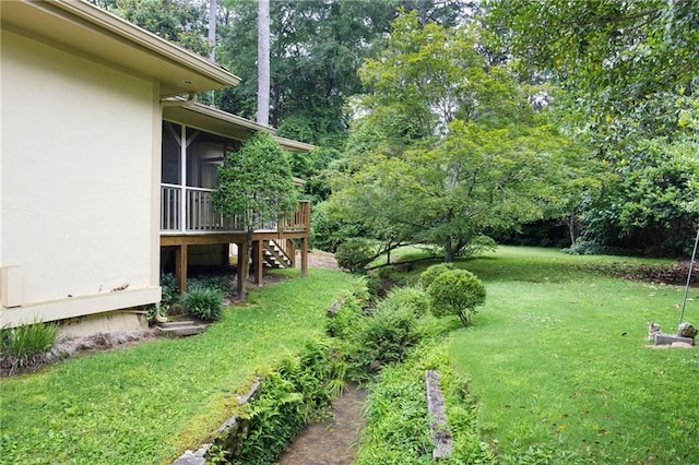 3272 Pinestream Rd NW, Atlanta, GA 30327 - view of grassy yard with stairs, a wooden deck, and view of scattered trees