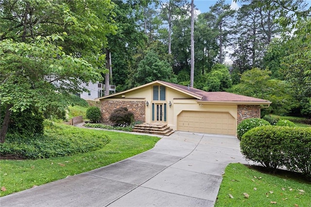 3272 Pinestream Rd NW, Atlanta, GA 30327 - mid-century modern home featuring stone siding, driveway, stucco siding, a garage, and a front lawn