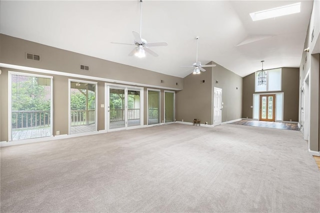 3272 Pinestream Rd NW, Atlanta, GA 30327 - unfurnished living room featuring carpet flooring, high vaulted ceiling, a skylight, and ceiling fan