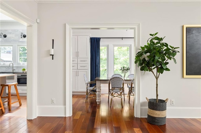 2015 N Decatur Rd NE, Atlanta, GA 30307 - dining room featuring baseboards and dark wood finished floors