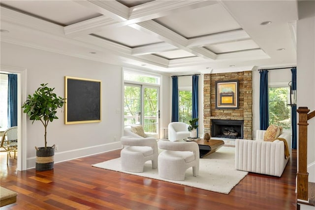 2015 N Decatur Rd NE, Atlanta, GA 30307 - living area with a stone fireplace, baseboards, beamed ceiling, and wood finished floors