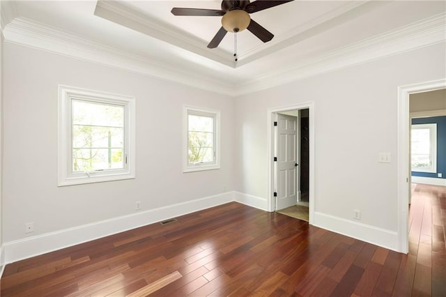 2015 N Decatur Rd NE, Atlanta, GA 30307 - spare room featuring dark wood-type flooring, visible vents, a ceiling fan, and a tray ceiling