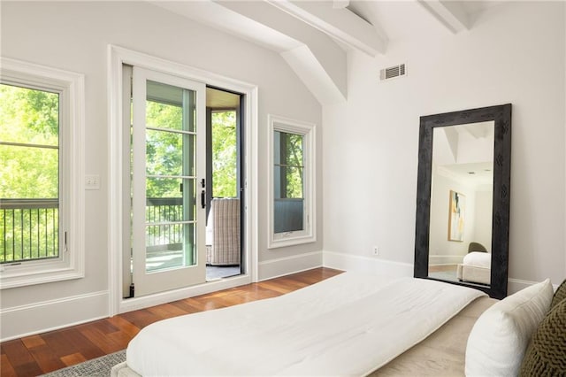 2015 N Decatur Rd NE, Atlanta, GA 30307 - bedroom featuring vaulted ceiling with beams, visible vents, access to exterior, and multiple windows
