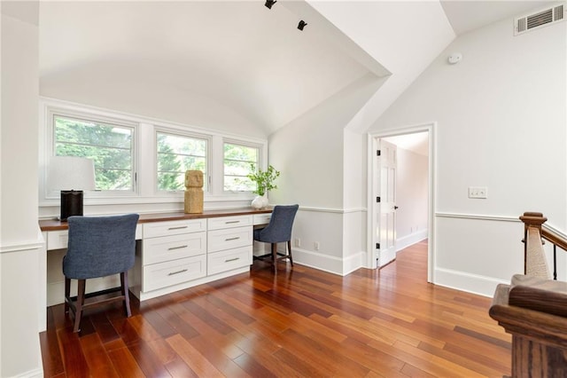 2015 N Decatur Rd NE, Atlanta, GA 30307 - office with visible vents, built in desk, vaulted ceiling, and dark wood finished floors