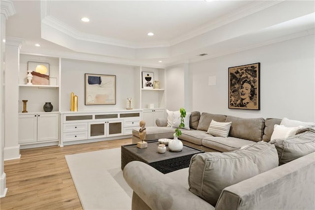 2015 N Decatur Rd NE, Atlanta, GA 30307 - living area with a tray ceiling, light wood-style floors, and ornamental molding