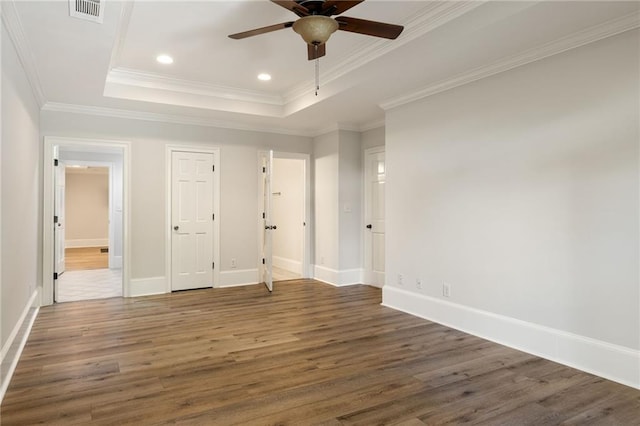 2015 N Decatur Rd NE, Atlanta, GA 30307 - unfurnished bedroom featuring a raised ceiling, visible vents, and wood finished floors