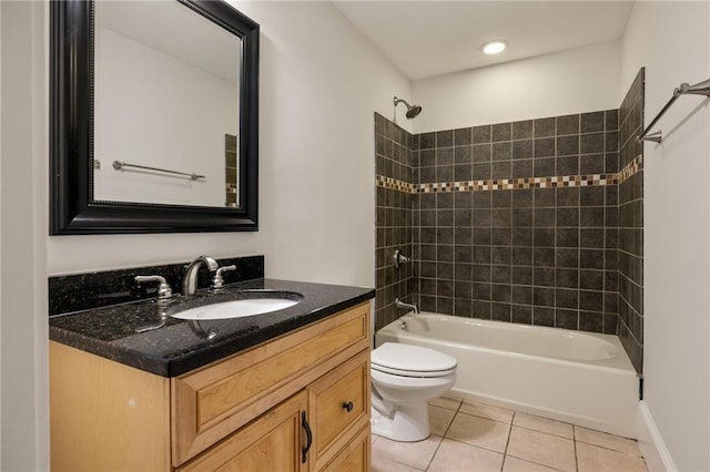 2015 N Decatur Rd NE, Atlanta, GA 30307 - bathroom with tile patterned floors, vanity, toilet, and tub / shower combination