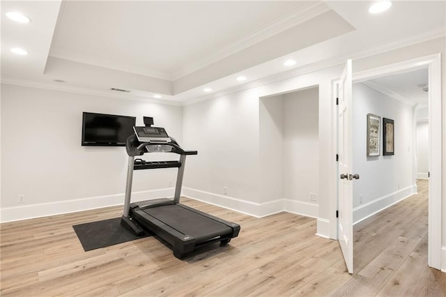 2015 N Decatur Rd NE, Atlanta, GA 30307 - exercise room featuring a tray ceiling, baseboards, recessed lighting, and wood finished floors