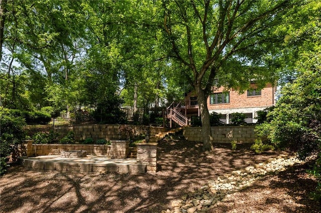 2015 N Decatur Rd NE, Atlanta, GA 30307 - view of yard featuring a patio area, fence, and stairs