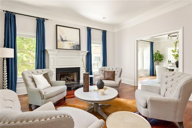 2015 N Decatur Rd NE, Atlanta, GA 30307 - living area with crown molding, baseboards, a premium fireplace, and wood finished floors