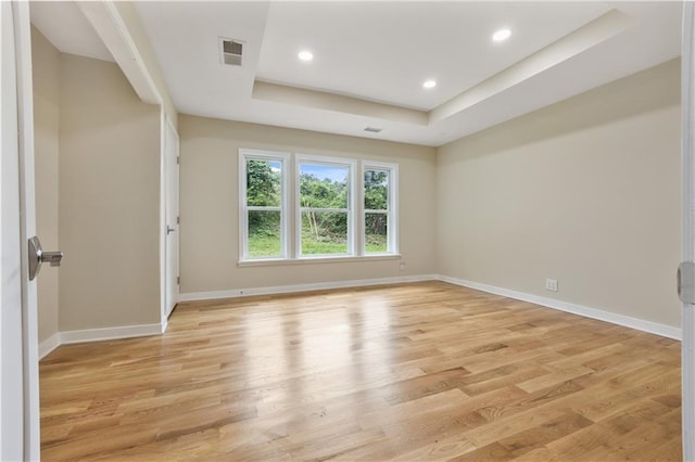 2552 Scenic Hwy S, Snellville, GA 30078 - empty room with light wood finished floors, a raised ceiling, baseboards, and recessed lighting