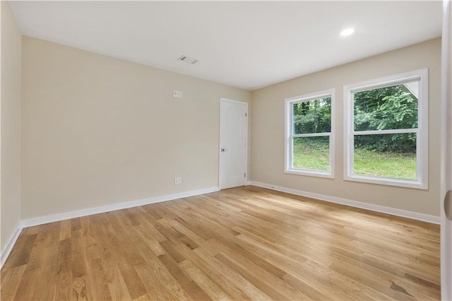 2552 Scenic Hwy S, Snellville, GA 30078 - spare room with baseboards, light wood-style floors, and recessed lighting