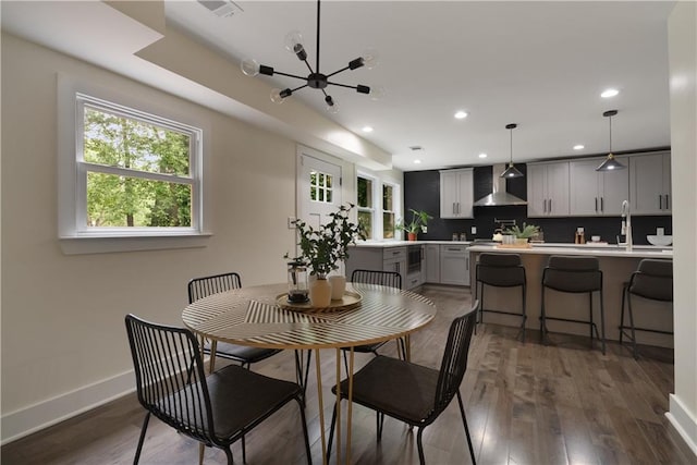 1218 Crestwood Dr SE, Atlanta, GA 30316 - dining space with a chandelier, recessed lighting, dark wood finished floors, and wine cooler