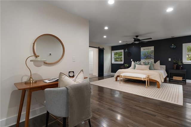 1218 Crestwood Dr SE, Atlanta, GA 30316 - bedroom with a barn door, recessed lighting, multiple windows, and wood finished floors