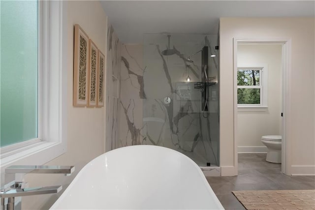1218 Crestwood Dr SE, Atlanta, GA 30316 - full bath with a marble finish shower and a soaking tub