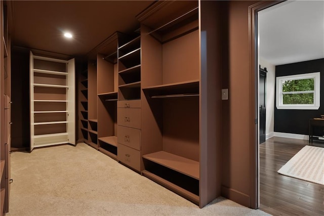 1218 Crestwood Dr SE, Atlanta, GA 30316 - walk in closet with wood finished floors