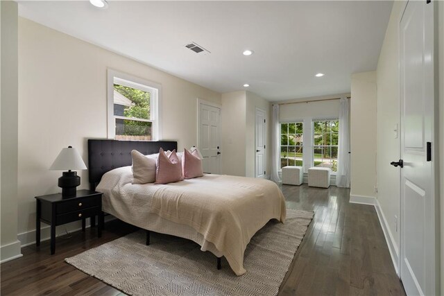 1218 Crestwood Dr SE, Atlanta, GA 30316 - bedroom featuring multiple windows, dark wood-style flooring, and recessed lighting