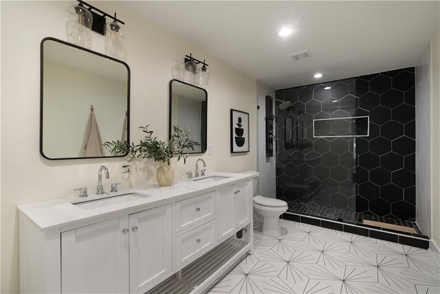 1218 Crestwood Dr SE, Atlanta, GA 30316 - bathroom featuring double vanity, a shower stall, recessed lighting, and tile patterned floors