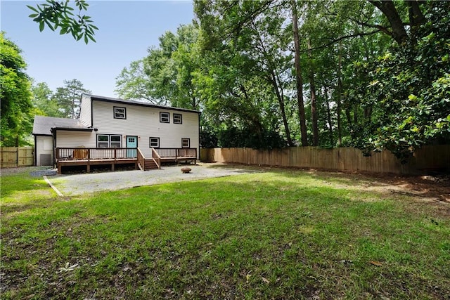 1218 Crestwood Dr SE, Atlanta, GA 30316 - back of house with a fenced backyard and a wooden deck