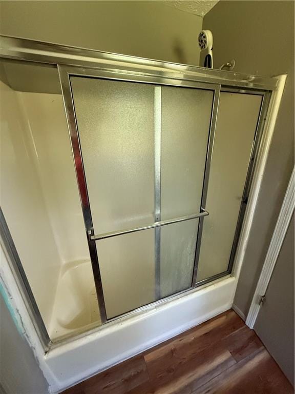 bathroom featuring wood finished floors