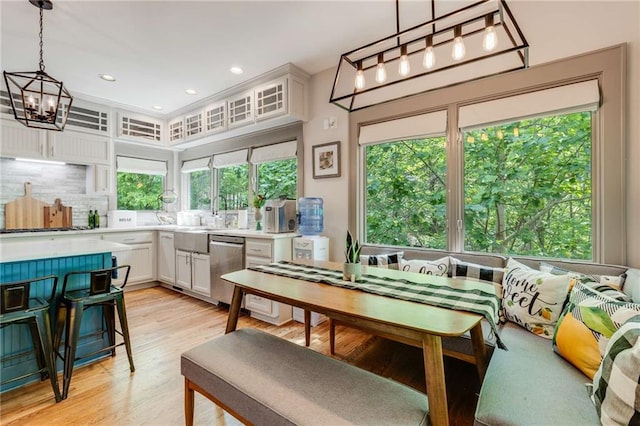 99 Bree Ln, Canton, GA 30114 - dining area featuring recessed lighting, a notable chandelier, a healthy amount of sunlight, and light wood-style floors