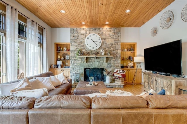 99 Bree Ln, Canton, GA 30114 - living room with a fireplace, wood ceiling, light wood finished floors, and recessed lighting