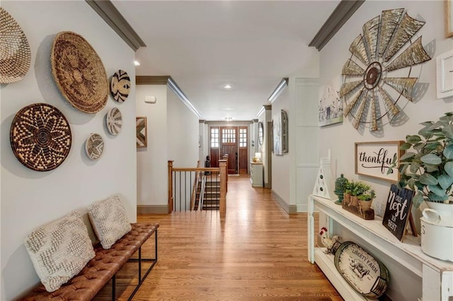 99 Bree Ln, Canton, GA 30114 - corridor featuring crown molding, baseboards, and light wood-style floors