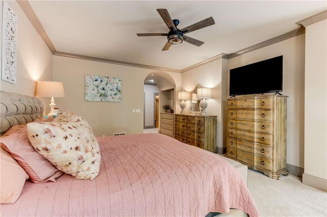 99 Bree Ln, Canton, GA 30114 - bedroom featuring visible vents, ornamental molding, a ceiling fan, carpet flooring, and arched walkways