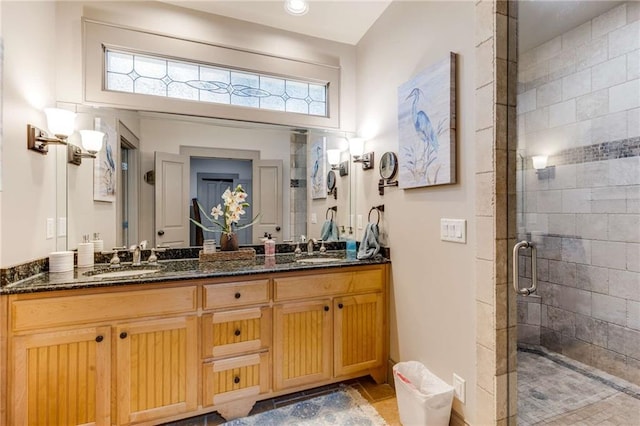 99 Bree Ln, Canton, GA 30114 - full bathroom with double vanity, plenty of natural light, a sink, and a stall shower