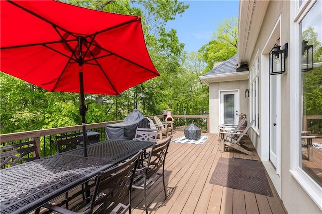 99 Bree Ln, Canton, GA 30114 - wooden deck featuring outdoor dining space