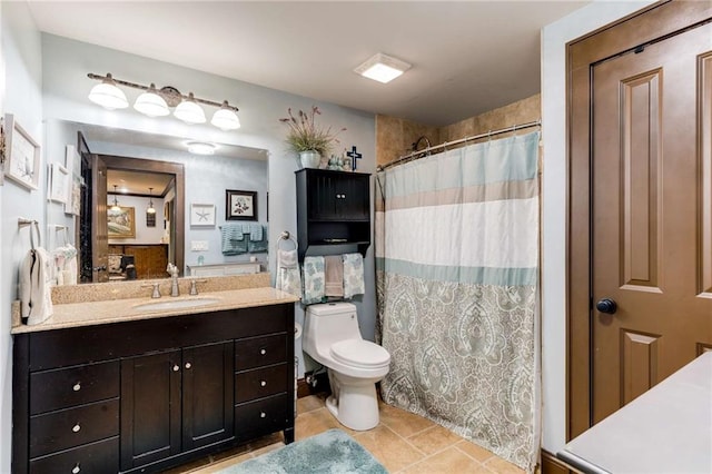 99 Bree Ln, Canton, GA 30114 - bathroom with tile patterned floors, vanity, toilet, and a shower with shower curtain